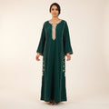 Caftan vert émeraude brodé fleurs ivoire